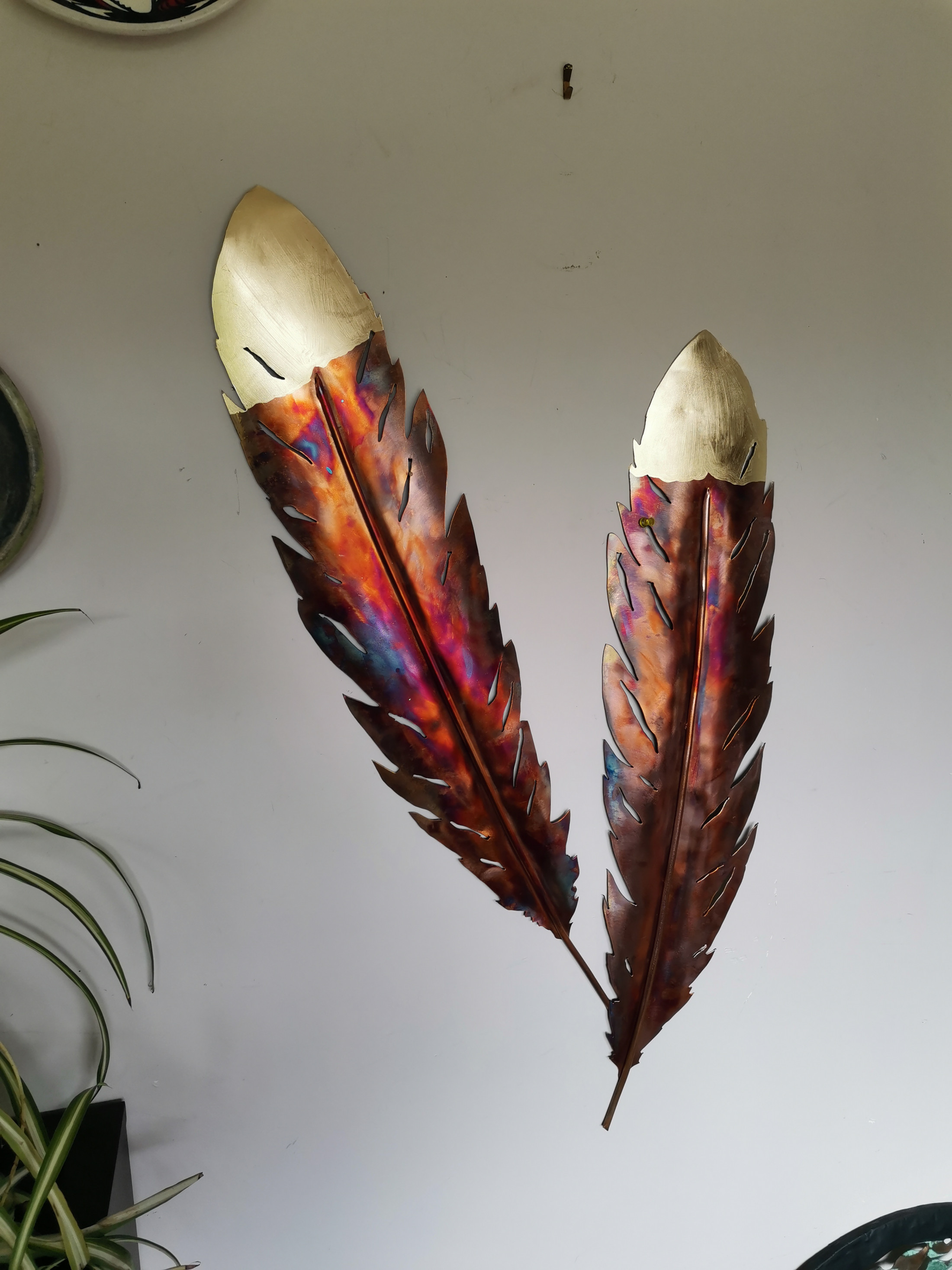 Trish Clarke Flame coloured Gold tipped feathers